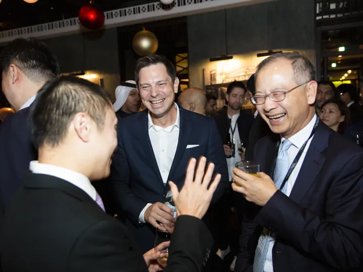 Guests connecting at a dinner reception