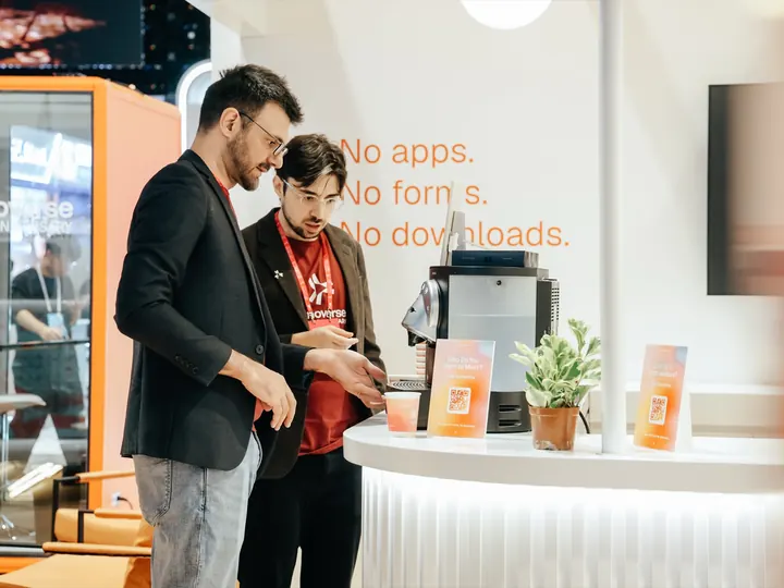 A FinoverseAI host at an event counter