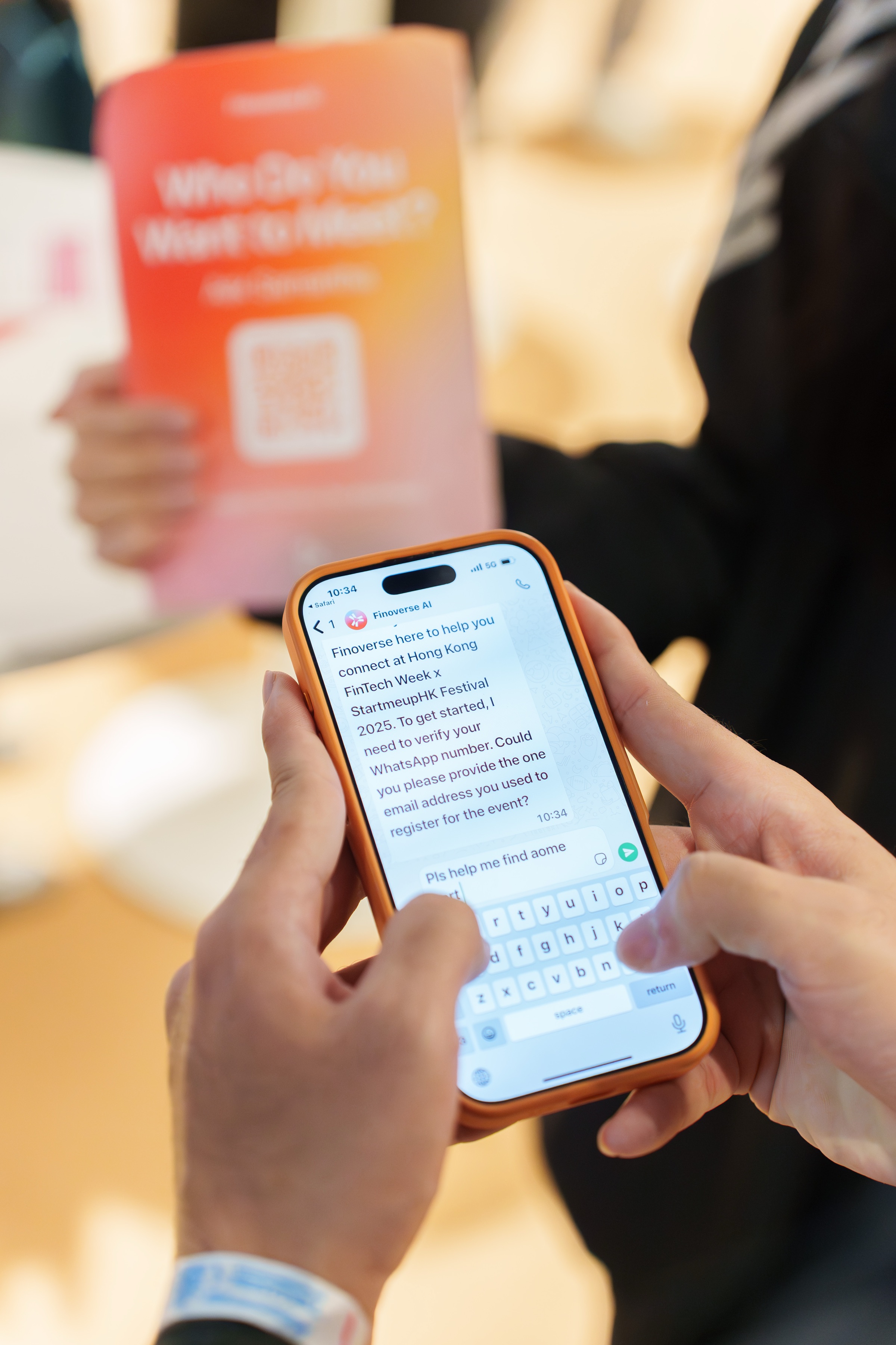 An attendee messaging Samantha on WhatsApp at Hong Kong FinTech Week 2025